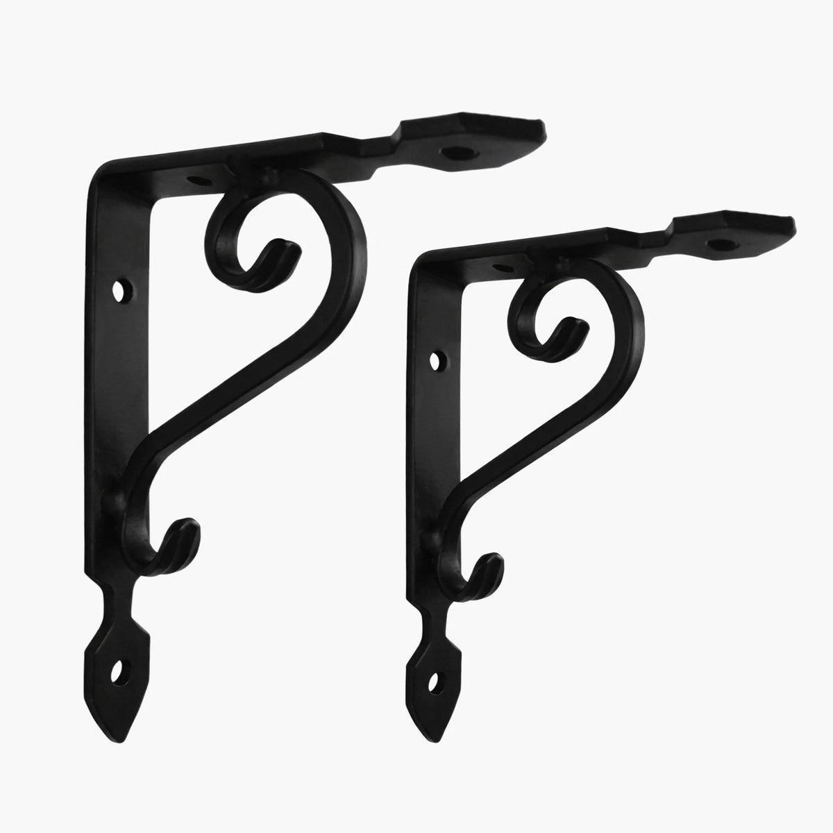 Ornate scroll shelf brackets in black wrought iron