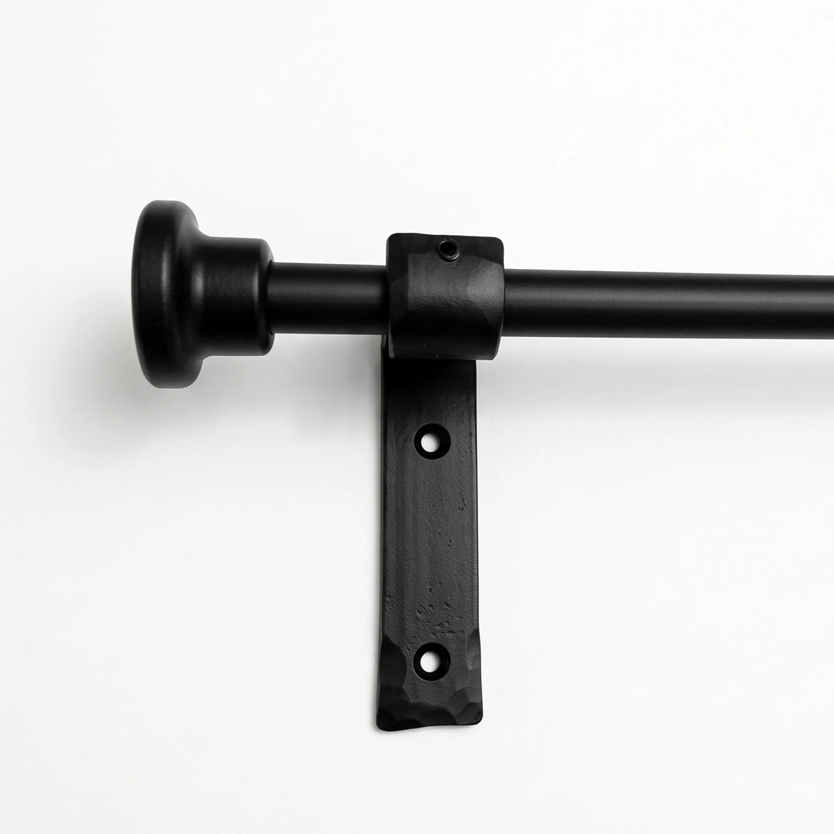 Remove curtain rings from wrought iron curtain pole