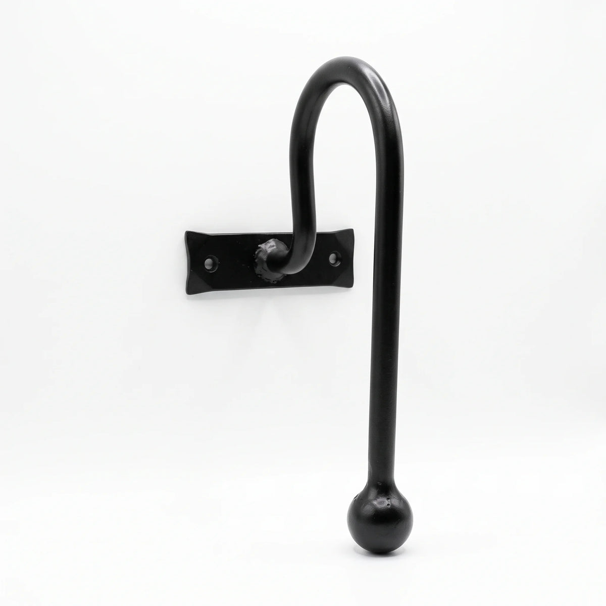 Black wrought iron curtain pole bracket with decorative round finial